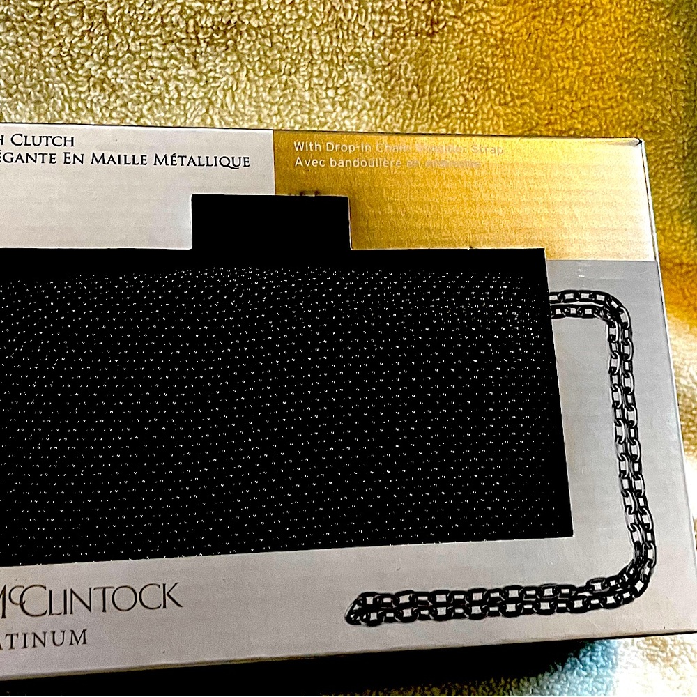 Black clutch with chain strap